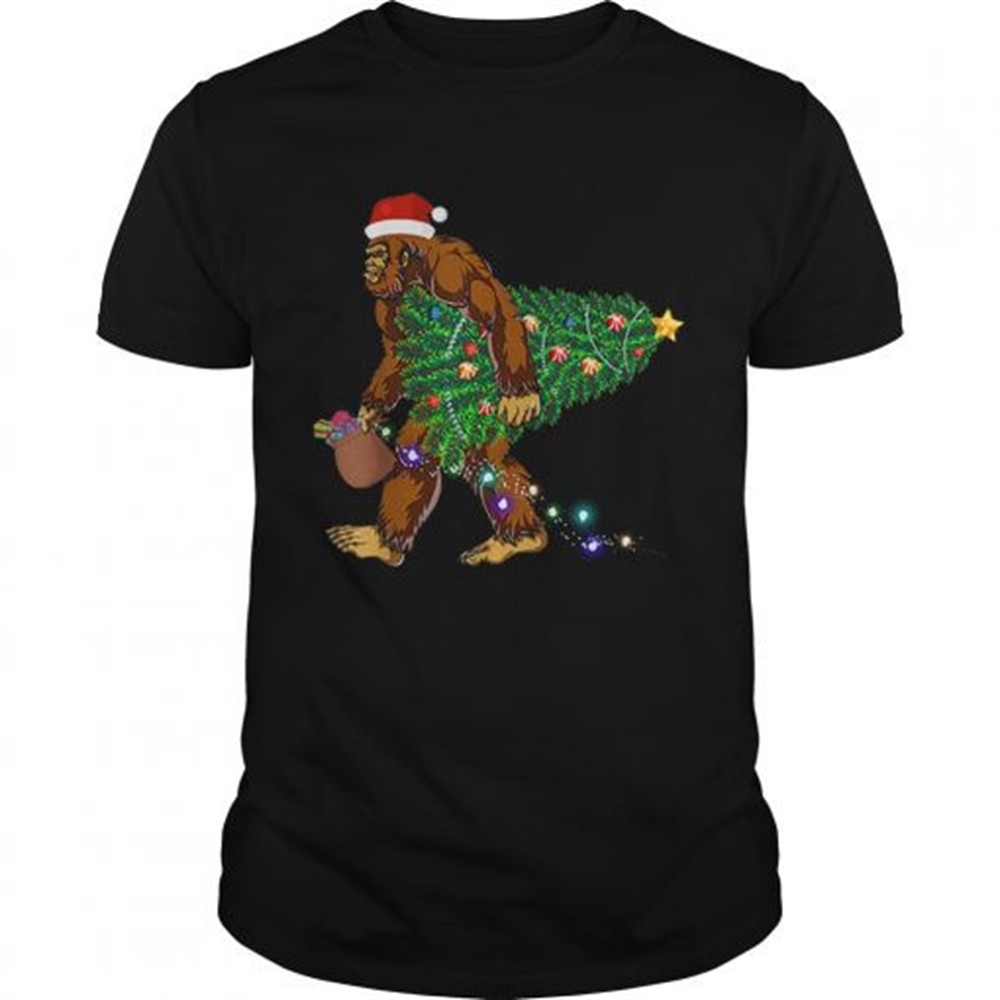 bigfoot-carrying-christmas-tree-sasquatch-santa-shirt-84tbejj8 Bigfoot Carrying Christmas Tree Sasquatch Santa shirt