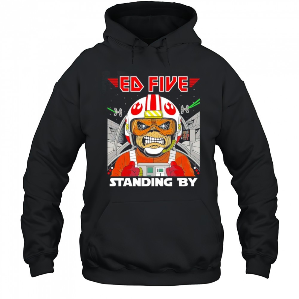 Ed Five standing by shirt