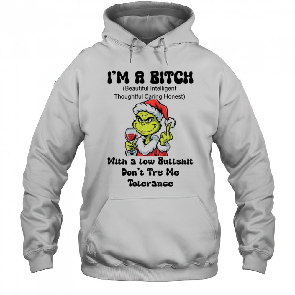 Grinch Santa hat middle finger Im a bitch with a low bullshit dont try me tolerance Christmas shirt