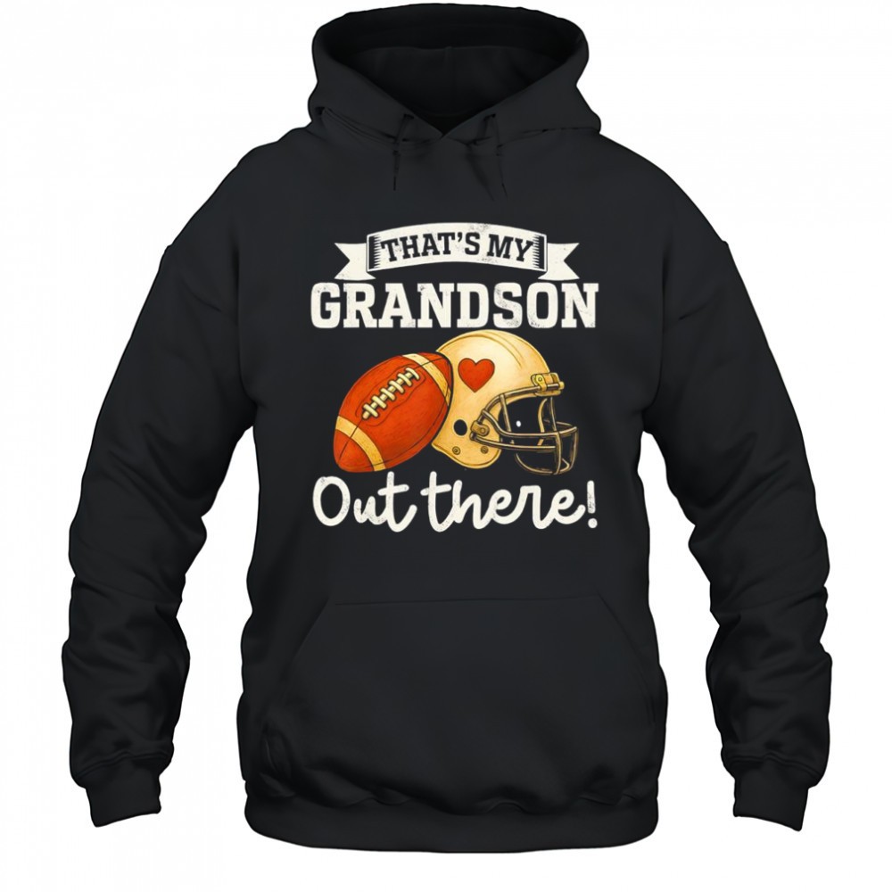 Thats my grandson out there football helmet shirt