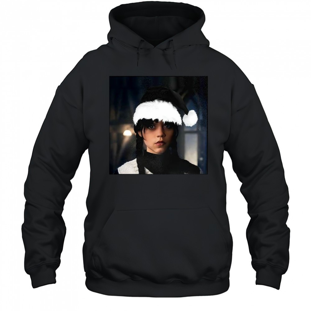 Wednesday was wearing a Santa hat Christmas shirt